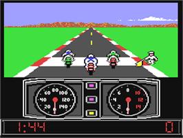 In game image of Super Cycle on the Commodore 64.