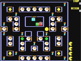 In game image of Super Pac-Man on the Commodore 64.