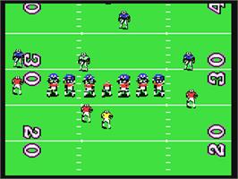 In game image of TV Sports: Football on the Commodore 64.