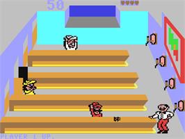 In game image of Tapper on the Commodore 64.