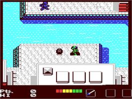 In game image of Teenage Mutant Ninja Turtles on the Commodore 64.