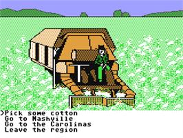 In game image of The Spy's Adventures in North America on the Commodore 64.
