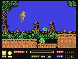 In game image of Toki: Going Ape Spit on the Commodore 64.