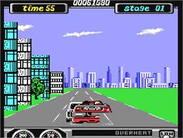 In game image of Turbo Outrun on the Commodore 64.