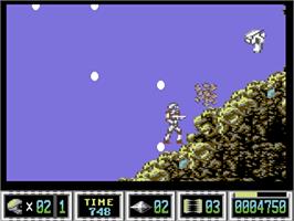 In game image of Turrican II: The Final Fight on the Commodore 64.