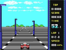 In game image of WEC Le Mans on the Commodore 64.