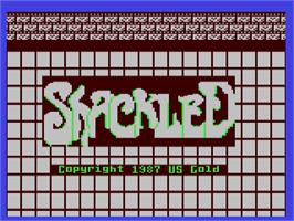 Title screen of Shackled on the Commodore 64.