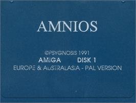 Top of cartridge artwork for Amnios on the Commodore Amiga.