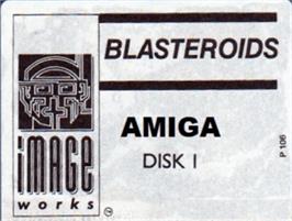 Top of cartridge artwork for Blasteroids on the Commodore Amiga.