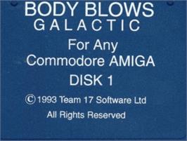 Top of cartridge artwork for Body Blows Galactic on the Commodore Amiga.