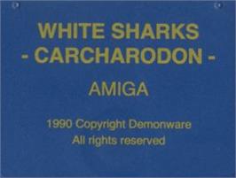 Top of cartridge artwork for Carcharodon: White Sharks on the Commodore Amiga.