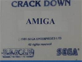 Top of cartridge artwork for Crack Down on the Commodore Amiga.