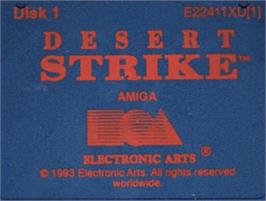 Top of cartridge artwork for Desert Strike: Return to the Gulf on the Commodore Amiga.