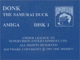 Top of cartridge artwork for Donk!: The Samurai Duck on the Commodore Amiga.