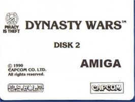 Top of cartridge artwork for Dynasty Wars on the Commodore Amiga.