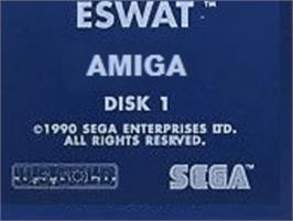 Top of cartridge artwork for E-SWAT: Cyber Police on the Commodore Amiga.