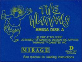 Top of cartridge artwork for Humans on the Commodore Amiga.