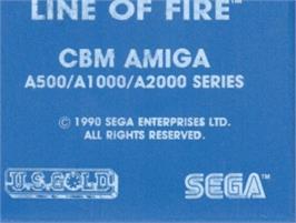 Top of cartridge artwork for Line of Fire / Bakudan Yarou on the Commodore Amiga.