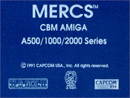 Top of cartridge artwork for Mercs on the Commodore Amiga.