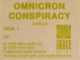 Top of cartridge artwork for Omnicron Conspiracy on the Commodore Amiga.