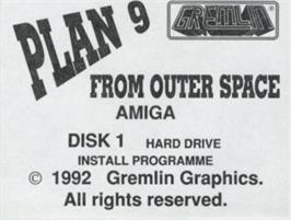 Top of cartridge artwork for Plan 9 From Outer Space on the Commodore Amiga.