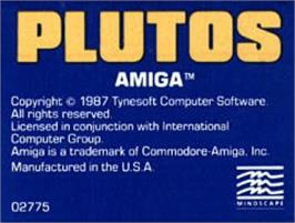 Top of cartridge artwork for Plutos on the Commodore Amiga.