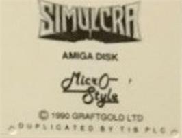 Top of cartridge artwork for Simulcra on the Commodore Amiga.
