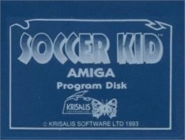 Top of cartridge artwork for Soccer Kid on the Commodore Amiga.