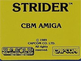 Top of cartridge artwork for Strider on the Commodore Amiga.