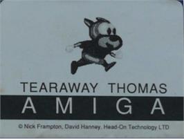 Top of cartridge artwork for Tearaway Thomas on the Commodore Amiga.
