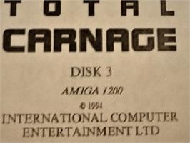 Top of cartridge artwork for Total Carnage on the Commodore Amiga.