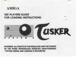 Top of cartridge artwork for Tusker on the Commodore Amiga.