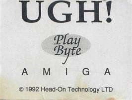 Top of cartridge artwork for Ugh on the Commodore Amiga.