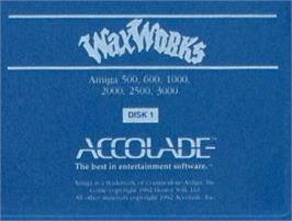 Top of cartridge artwork for Waxworks on the Commodore Amiga.