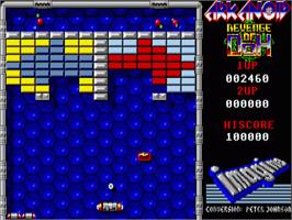 In game image of Arkanoid - Revenge of DOH on the Commodore Amiga.