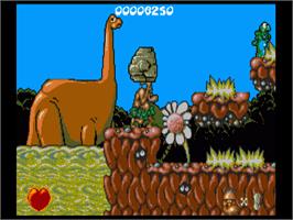 In game image of Chuck Rock on the Commodore Amiga.