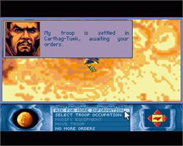 In game image of Dune 2 on the Commodore Amiga.