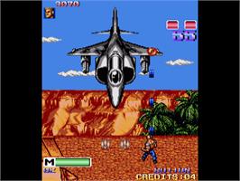In game image of Mercs on the Commodore Amiga.