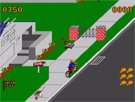 In game image of Paperboy on the Commodore Amiga.