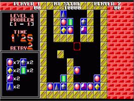 In game image of Puzznic on the Commodore Amiga.