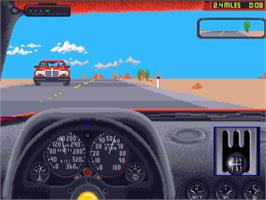 In game image of Test Drive II Car Disk: The Supercars on the Commodore Amiga.