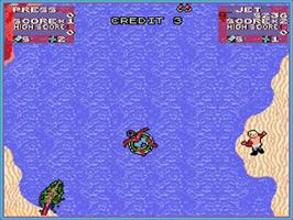 In game image of Toobin' on the Commodore Amiga.