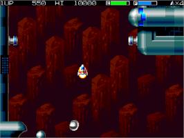 In game image of Fly Harder on the Commodore Amiga CD32.
