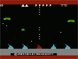 In game image of Defender on the Commodore VIC-20.
