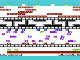 In game image of Frogger on the Commodore VIC-20.
