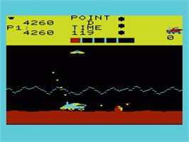 In game image of Moon Patrol on the Commodore VIC-20.