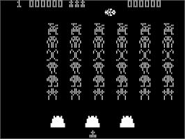 In game image of Color Space Invaders on the Dragon 32-64.