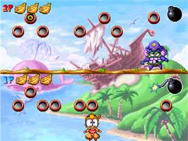 In game image of Woody & Kunta - Treasure Island on the Gamepark GP32.