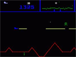 In game image of Defender on the Mattel Intellivision.