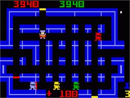 In game image of Lock'n'Chase on the Mattel Intellivision.